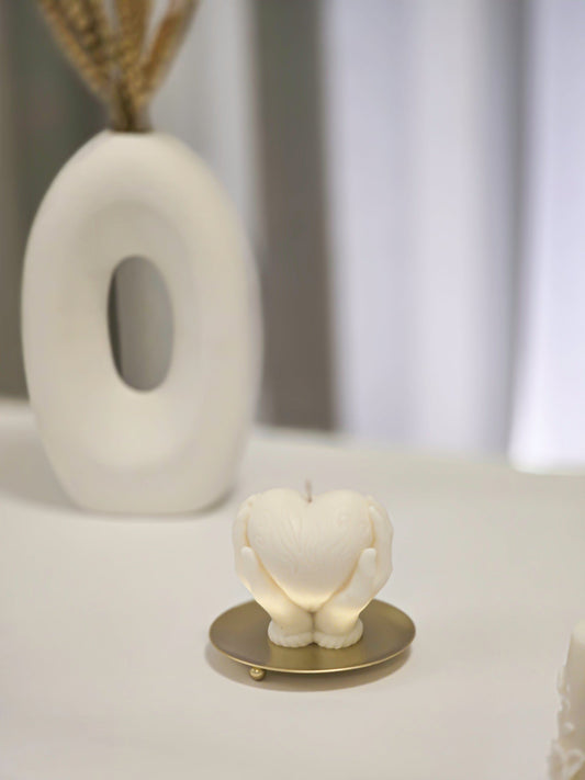 Holding Heart Candle