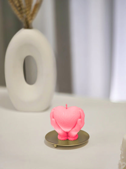 Holding Heart Candle